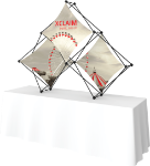 Picture of Xclaim 8ft Tabletop 3 Quad Pyramid Fabric Popup Display Kit 01
